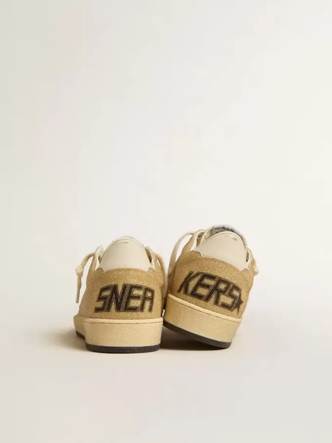 Ball Star en cristales Swarovski dorados con estrella de cuero blanco lechoso