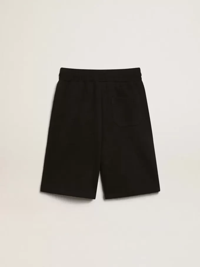 Bermudas negras para niño con estrellas blancas