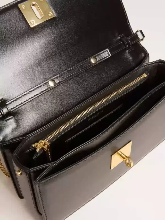Bolso Gioia en piel negra con detalles dorados
