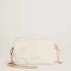 Bolso Mini Star en piel color blanco mantequilla con estrella tono sobre tono