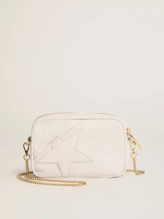 Bolso Mini Star en piel color blanco mantequilla con estrella tono sobre tono