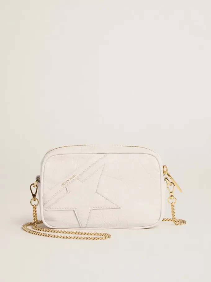 Bolso Mini Star en piel color blanco mantequilla con estrella tono sobre tono