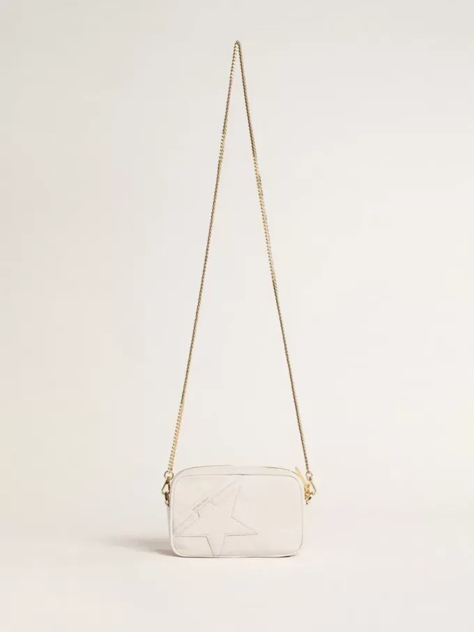 Bolso Mini Star en piel color blanco mantequilla con estrella tono sobre tono