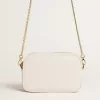 Bolso Mini Star en piel color blanco mantequilla con estrella tono sobre tono