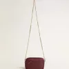 Bolso Mini Star en piel color vino con estrella tono sobre tono