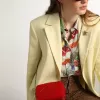 Bolso Mini Star para mujer en piel pintada de color rojo con estrella tono sobre tono