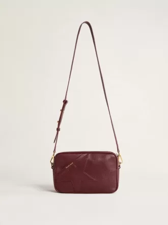 Bolso Star en piel color vino con estrella tono sobre tono