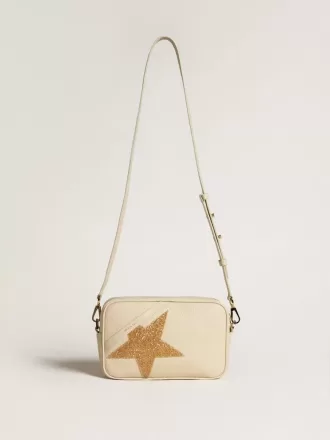 Bolso Star en piel martillada color mantequilla con estrella de cristal Swarovski