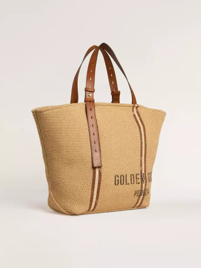 Bolso tote 24.7 en rafia natural y piel marrón con detalles metálicos dorados