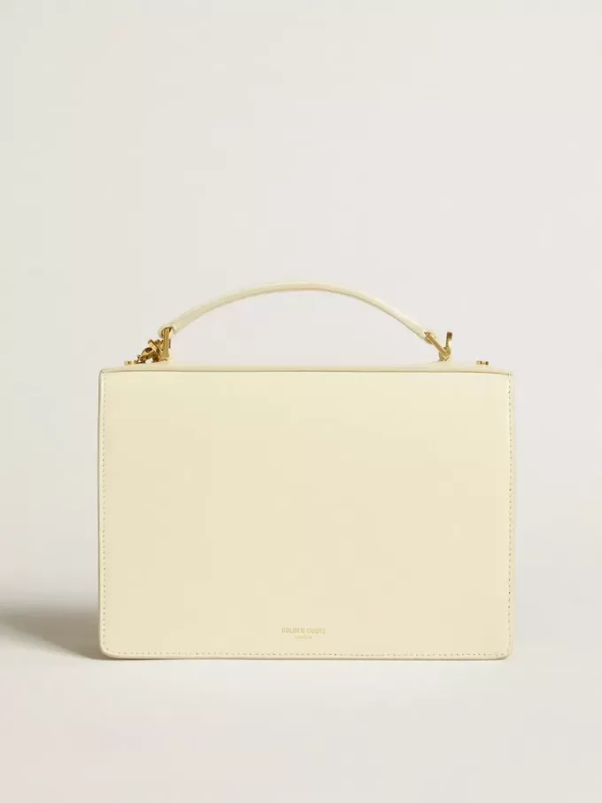 Bolso Venezia en piel acolchada color mantequilla con doble charm Bolso Venezia en piel acolchada color mantequilla con doble charm