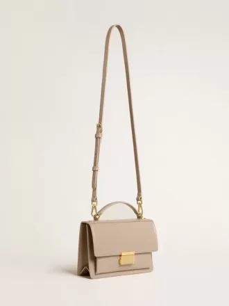 Bolso Venezia en piel beige con ribetes y detalles dorados