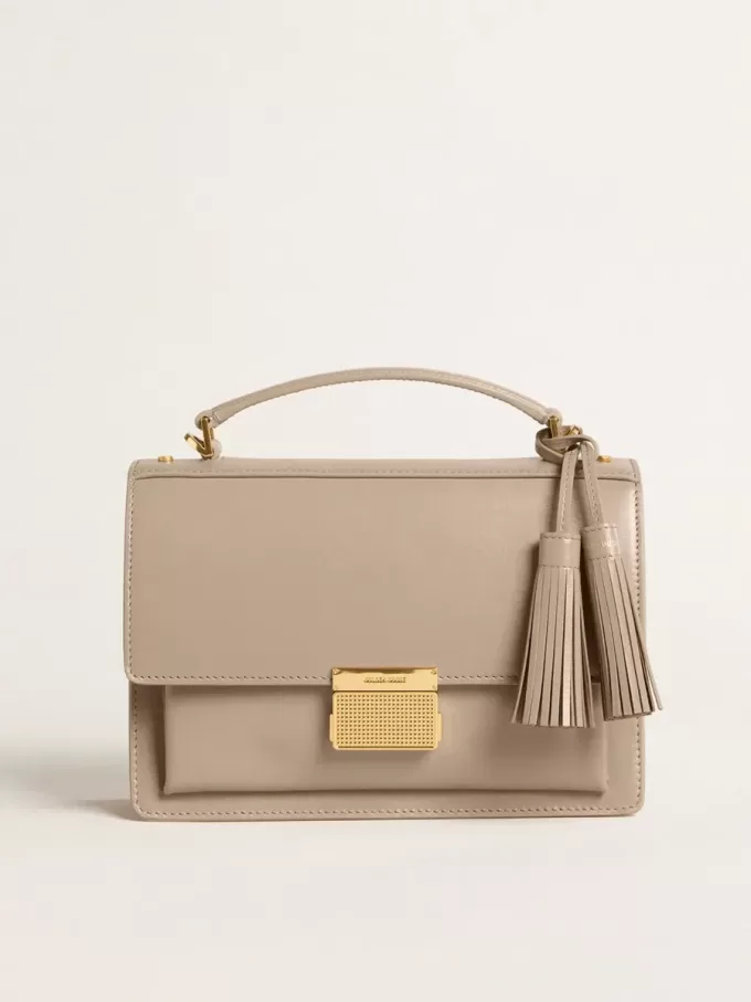 Bolso Venezia en piel beige con ribetes y detalles dorados
