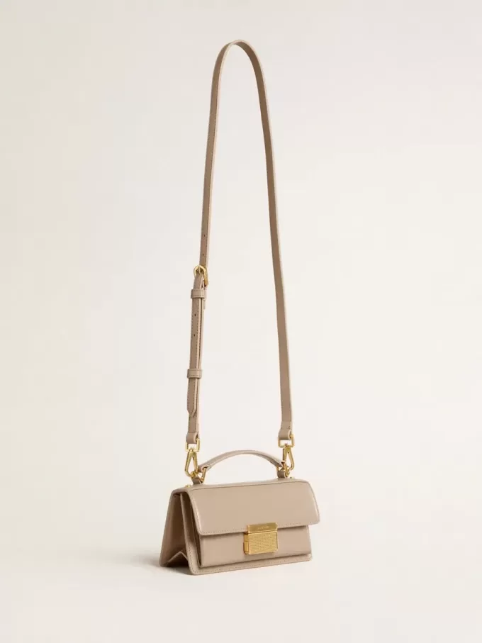 Bolso Venezia pequeño en piel beige con detalles dorados Bolso Venezia pequeño en piel beige con detalles dorados