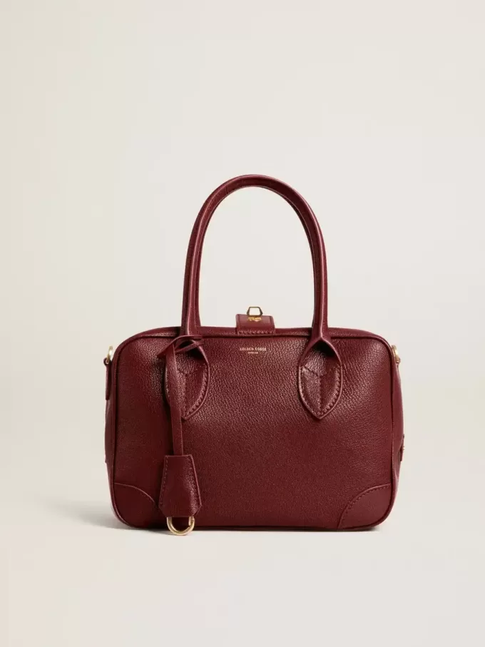 Bolso Vita en piel burdeos con detalles dorados
