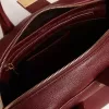Bolso Vita en piel burdeos con detalles dorados