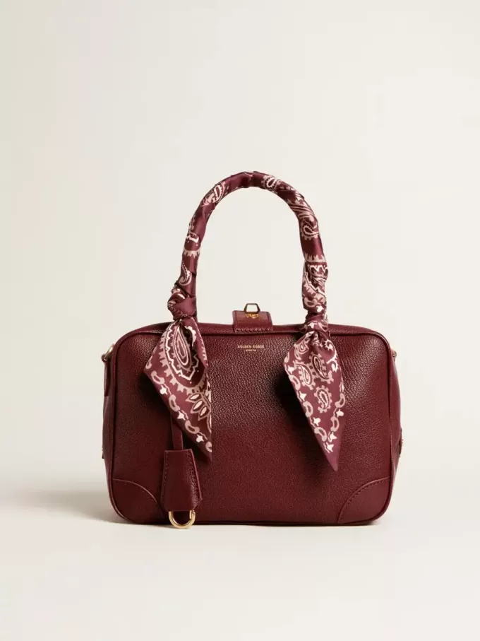 Bolso Vita en piel burdeos con detalles dorados