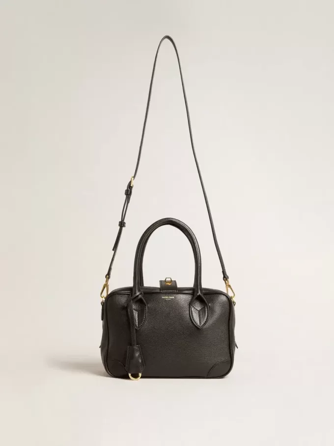 Bolso Vita en piel de oveja negra con detalles dorados