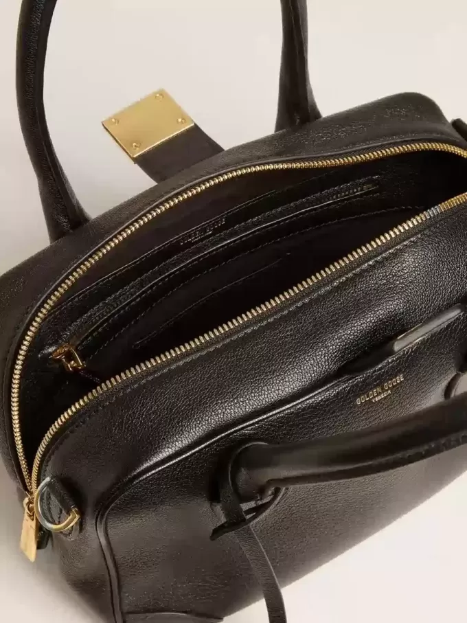 Bolso Vita en piel de oveja negra con detalles dorados