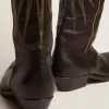Botas Wish Star para mujer en piel negra con estrella incrustada en piel laminada platino Botas Wish Star para mujer en piel negra con estrella incrustada en piel laminada platino