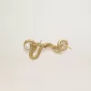 Broche antiguo dorado con forma de serpiente CNY