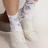 Calcetines blancos ópticos con letras negras