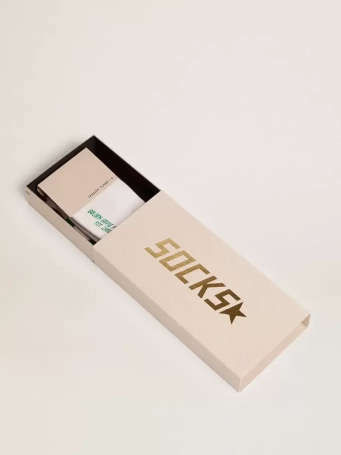 Calcetines de algodón con acabados desgastados, rayas verdes y logotipo