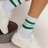 Calcetines de algodón con acabados desgastados, rayas verdes y logotipo