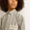 Camisa a rayas para niño con detalle Golden Dreamers en el bolsillo