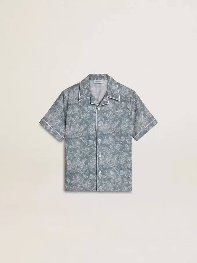 Camisa azul para niño con estampado blanco Camisa azul para niño con estampado blanco