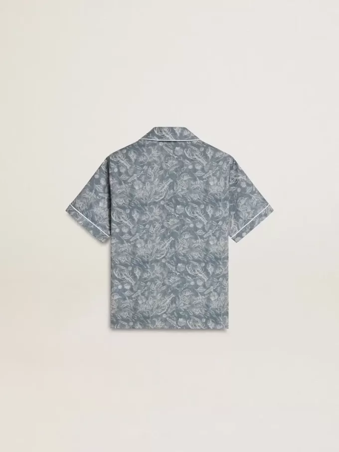 Camisa azul para niño con estampado blanco Camisa azul para niño con estampado blanco