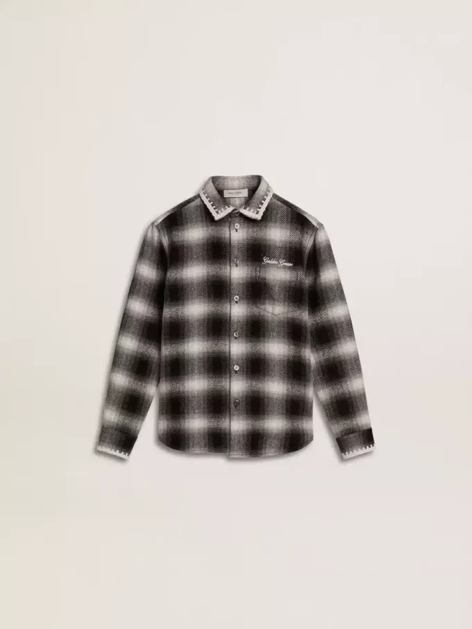 Camisa infantil a cuadros blancos y negros con bordados blancos