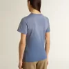 Camiseta azul claro descolorida para mujer con estampado en el pecho Camiseta azul claro descolorida para mujer con estampado en el pecho