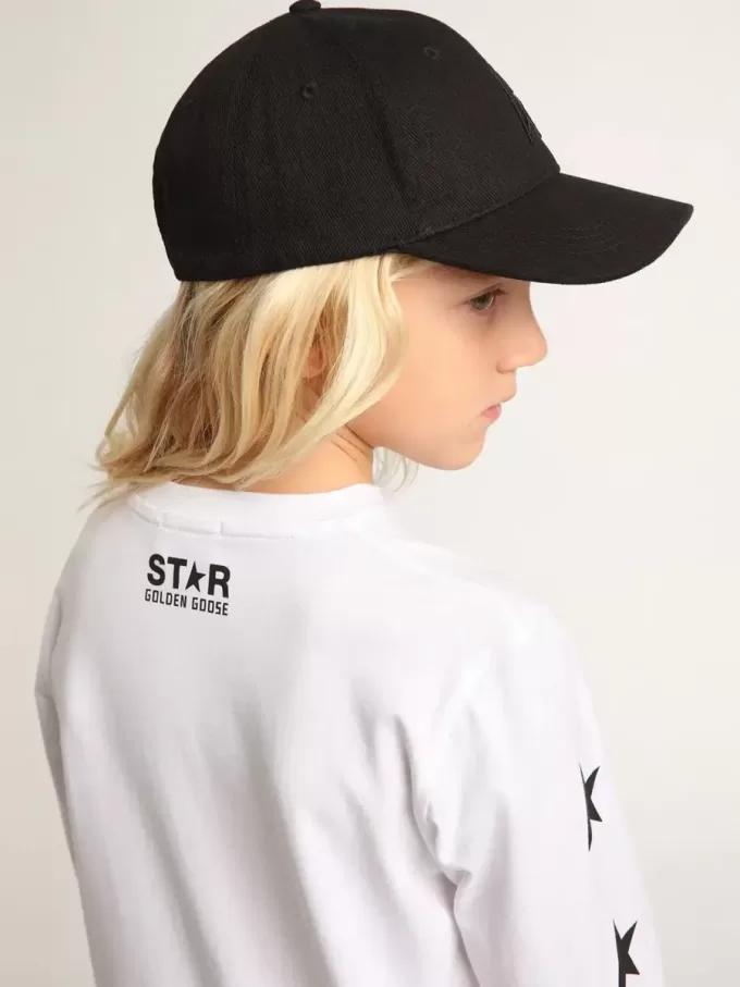 Camiseta blanca de manga larga con estrellas negras en contraste Camiseta blanca de manga larga con estrellas negras en contraste