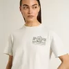 Camiseta blanca para mujer con estampado negro en el pecho Camiseta blanca para mujer con estampado negro en el pecho