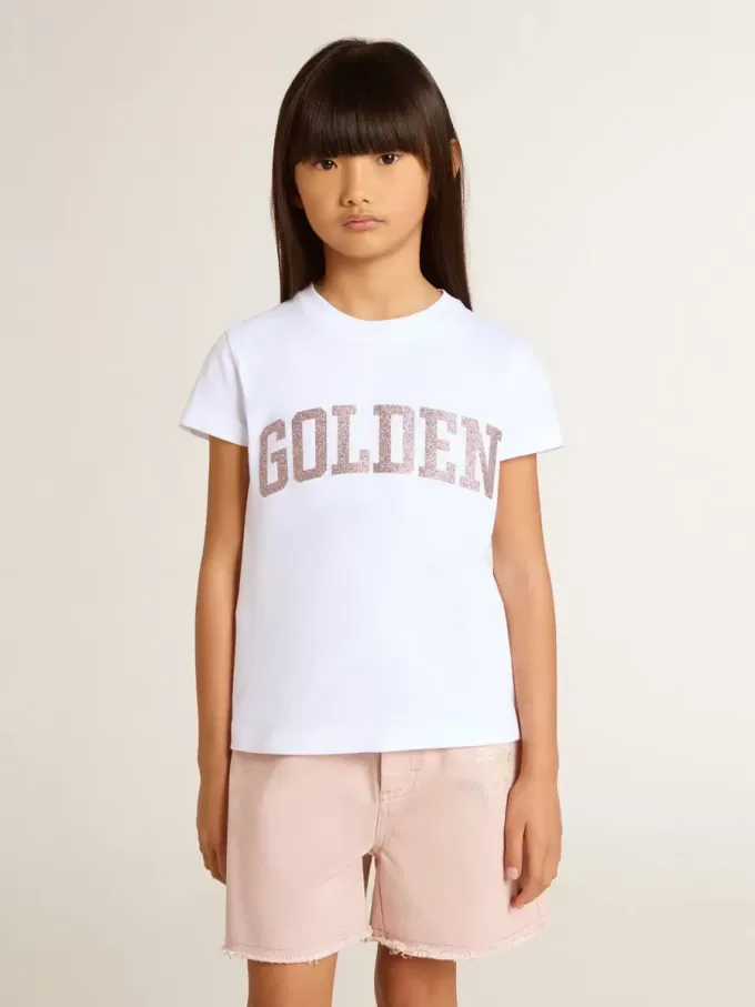 Camiseta blanca para niña con letras doradas y purpurina rosa.
