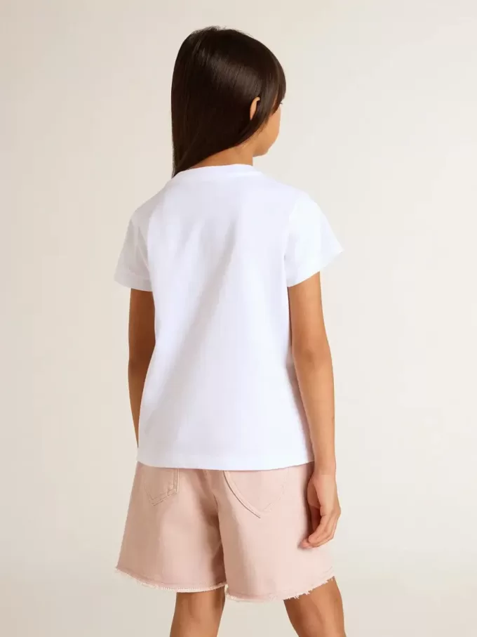 Camiseta blanca para niña con letras doradas y purpurina rosa.