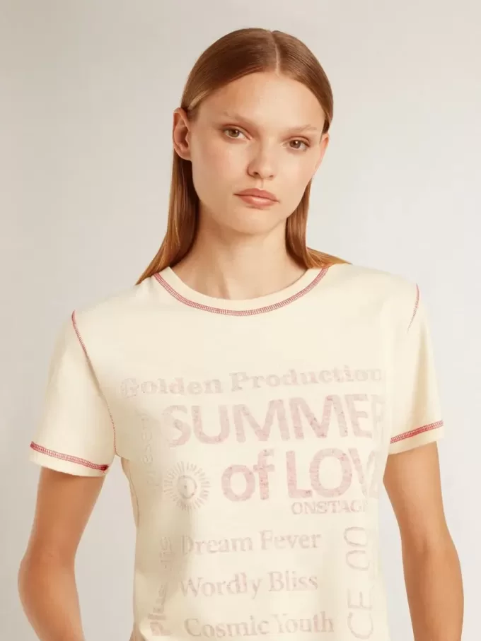 Camiseta crema para mujer con detalles en rojo descolorido