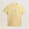 Camiseta de algodón para hombre en color amarillo pálido con letras descoloridas