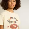 Camiseta para niño en blanco desgastado con letras multicolor