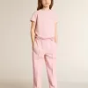 Camiseta rosa para niña con logotipo plateado brillante y estrella maxi