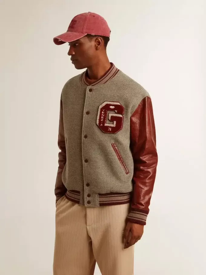 Cazadora bomber de lana gris jaspeada con mangas de cuero