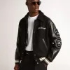 Cazadora bomber de lana negra con parche