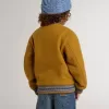 Cazadora bomber infantil de lana en color amarillo ocre con parche