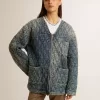 Chaqueta acolchada azul para mujer en denim de algodón con acabado desgastado