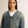 Chaqueta acolchada azul para mujer en denim de algodón con acabado desgastado