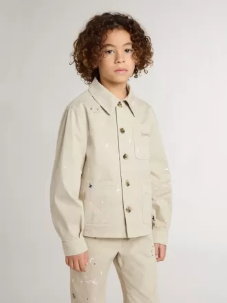 Chaqueta beige para niño con salpicaduras multicolores