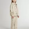 Chaqueta beige para niño con salpicaduras multicolores Chaqueta beige para niño con salpicaduras multicolores