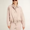 Chaqueta bomber de denim teñida de rosa para mujer
