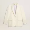Chaqueta oversize de botonadura sencilla en color blanco con efecto seda y bordados Chaqueta oversize de botonadura sencilla en color blanco con efecto seda y bordados