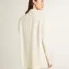 Chaqueta oversize de botonadura sencilla en color blanco con efecto seda y bordados Chaqueta oversize de botonadura sencilla en color blanco con efecto seda y bordados